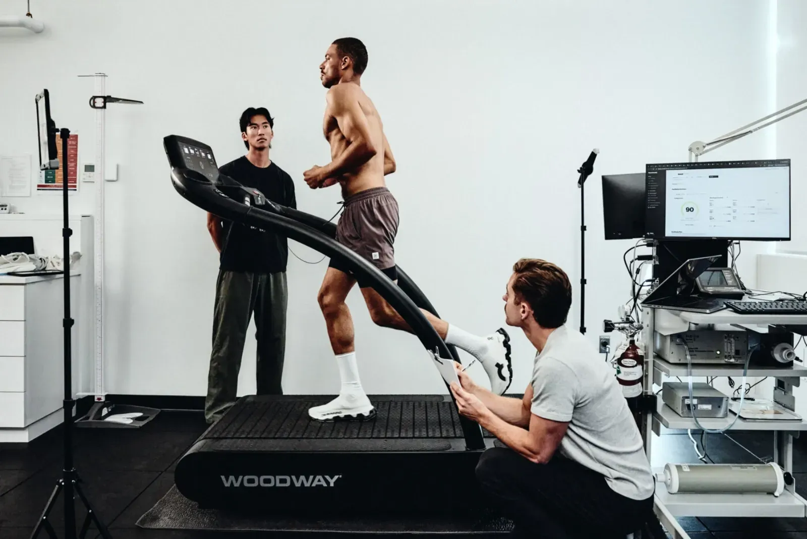 A runner completing a treadmill assessment with RunReady physiotherapists