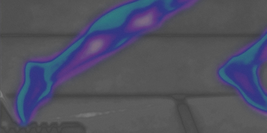 Runner in motion with thermal-style lighting